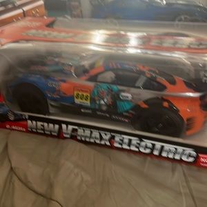 New - max Electric 2.4GHZ  high-speed engine, 2- 9.6V V batteries ,Shock